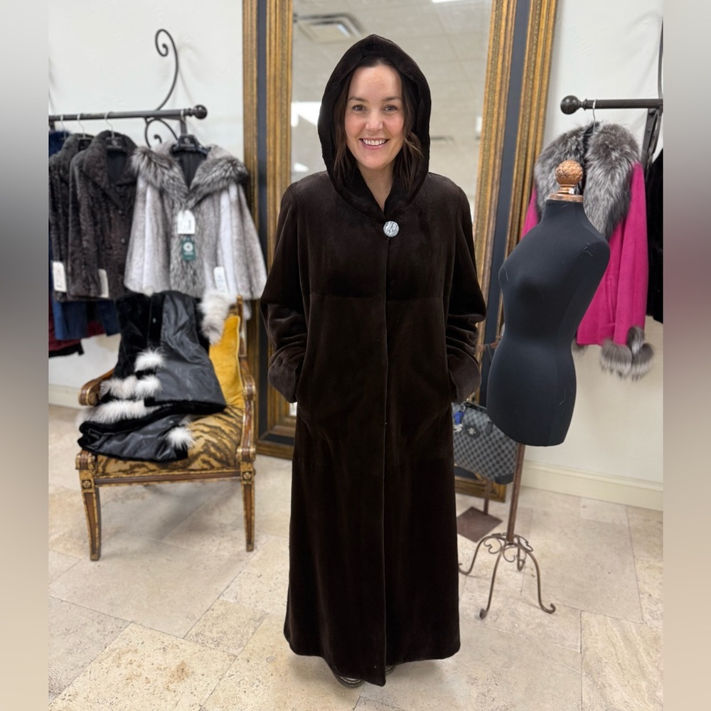 Dyed brown Sheared Mink Hooded Coat. Side slits/turn back cuffs